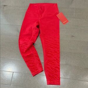 NWT sz 8 Red High-Waisted Leggings with cool red flames and gold logo